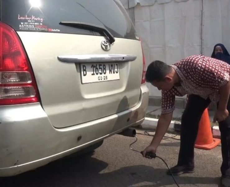 Ilustrasi uji emisi kendaraan (Voi.id)